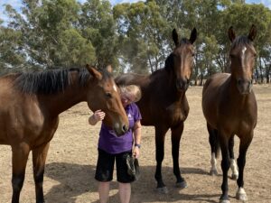 Woman talking with Maximus, Hugo and Timmy